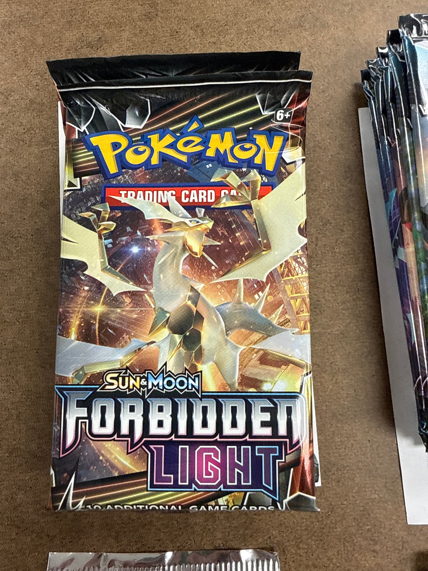 FORBIDDEN LIGHT BOOSTER PACK (10 CARDS)